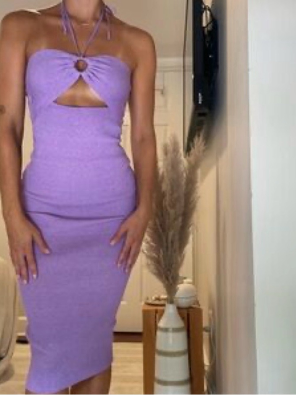 Adorable and flattering lavender dress with keyhole cut outs. South Moon Under.